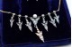 Conjunto de adereço em ouro e prata composto por Pulseira, Gargantilha e Brincos
