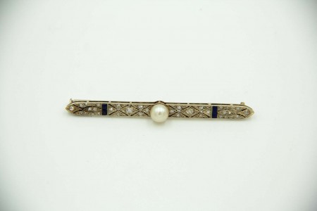 Alfinete de peito de ouro amarelo com diamantes em talhe brilhante e lascas