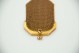 Porta-moedas em ouro amarelo em malha dupla e arco em forma de meio decógono.