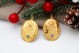 Brincos em ouro de formato oval  com relevos e turquesas com pérolas aplicadas.