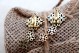 Brincos em ouro com (16) diamantes em talhe brilhante