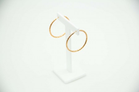 Par de argolas em ouro amarelo em formato torcido