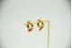 Brinco - argolas em ouro amarelo com segmentos escovados.