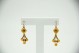 Brincos de ouro amarelo em forma de trevo ao estilo articulado e pérolas