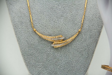 Conjunto em ouro bicolor com gargantilha, anel e pulseira com diamantes (119) em