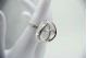  Conjunto em ouro branco de gargantilha e anel com diamantes (108) e iolites 