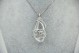  Conjunto em ouro branco de gargantilha e anel com diamantes (108) e iolites 