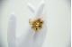 Conjunto em ouro amarelo de brincos e anel com diamantes