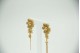 Conjunto em ouro amarelo de brincos e anel com diamantes