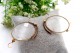 Óculos com estrutura em ouro amarelo e lentes