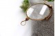 Óculos com estrutura em ouro amarelo e lentes