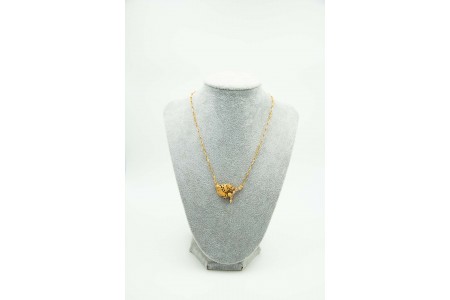 Gargantilha de ouro amarelo  em forma de cabeça de pantera com pintas 