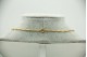 Gargantilha de ouro amarelo com diamantes (14) em talhe brilhante e safira austr
