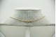 Gargantilha de ouro amarelo com pequeno crucifixo com diamantes