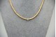 Gargantilha de ouro amarelo articulada com diamantes
