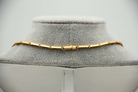 Gargantilha de ouro amarelo articulada com diamantes