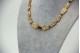 Gargantilha de ouro amarelo com diamantes (140) em talhe brilhante 8/8 e safiras
