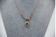 Gargantilha bicolor com ametista, granada e lascas de diamantes com pingente