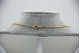 Gargantilha em ouro bicolor com diamantes (31) em talhe brilhante 8/8 