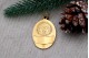 Medalha em ouro em forma oval com Nossa Senhora da Conceição em vulto perfeito 