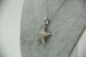 Medalha de ouro branco em forma de estrela do mar com diamantes (142) em talhe b