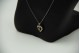 Medalha/pingente em ouro branco em forma de coração aberto com diamantes (20)