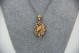 Medalha - Pingente em ouro amarelo com diamantes (67) em talhe brilhante 8/8