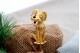 Pregadeira de ouro em forma de cão