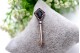 Pregadeira em ouro e prata com diamante em talhe brilhante, lascas de diamantes 