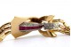 Pulseira em ouro com diamantes em talhe rosa e rubis calibrados