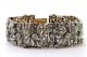 Pulseira em ouro e prata articulada com lascas e diamantes em talhe brilhante