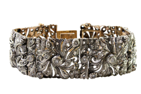 Pulseira em ouro e prata articulada com lascas e diamantes em talhe brilhante