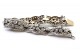 Pulseira em ouro e prata articulada com seis diamantes em talhe brilhante