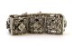 Pulseira em ouro e prata articulada com dez diamantes em talhe brilhante 