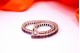 Pulseira em ouro branco com topázios calibrados coloridos e fecho de palheta.