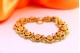Pulseira em ouro com esmaltes e rosinhas de Portugal com elos articulados.