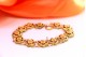 Pulseira em ouro com esmaltes e rosinhas de Portugal com elos articulados.