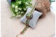 Pulseira em ouro com lascas de diamantes e esmeraldas