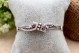  Pulseira em ouro branco ao estilo escrava de três fios com diamantes 