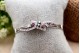  Pulseira em ouro branco ao estilo escrava de três fios com diamantes 