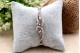  Pulseira em ouro branco ao estilo escrava de três fios com diamantes 
