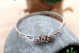  Pulseira em ouro branco ao estilo escrava de três fios com diamantes 