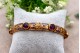 Pulseira em ouro com relevos e ametistas (6) lapidadas