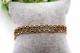 Pulseira em ouro com elos recortados.