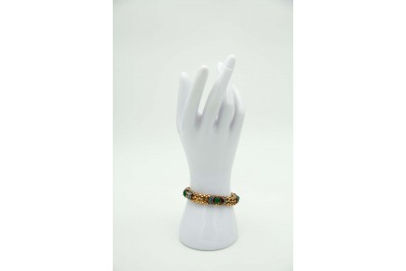 Pulseira em ouro amarelo com esmeraldas em formato cabochão e turquezas aplicada