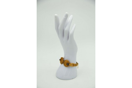Pulseira em ouro amarelo com aplicação de rosinhas, elos recortados ao estilo de