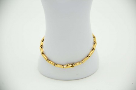 Pulseira em ouro amarelo articulada com diamantes (8) em talhe brilhante 8/8