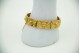  Pulseira poliarticulada em ouro amarelo com relevos de rosas e corrente 