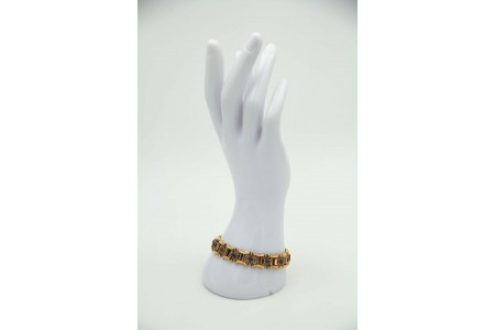 Pulseira de ouro com elos articulados e lascas de diamantes aplicadas