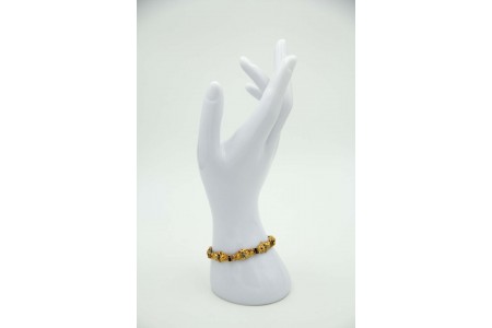 Pulseira articulada de ouro amarelo com rosinhas relevadas, lascas de diamantes